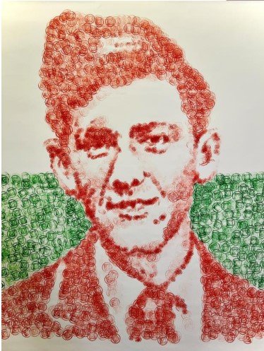 A two-tone portrait in red and green of a young man, made using tiny rubber stamps of a heart logo.