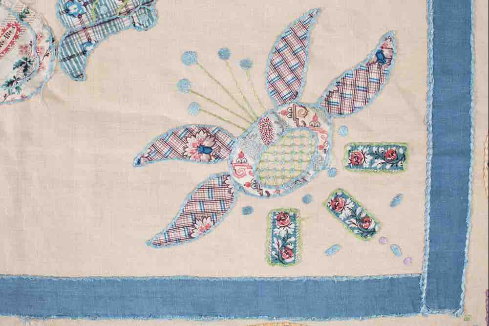 Antique quilt detail from the Ladies Work Society coverlet showing Arts and Crafts influence