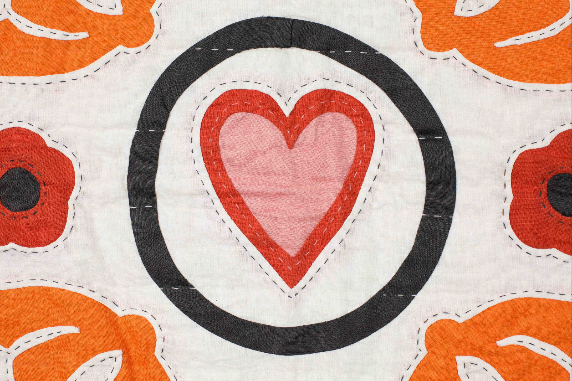 Garden Festival quilt by Karen Lewis inspired by the Ladies Work Society heritage quilt, featuring appliqué floral and paisley motifs
