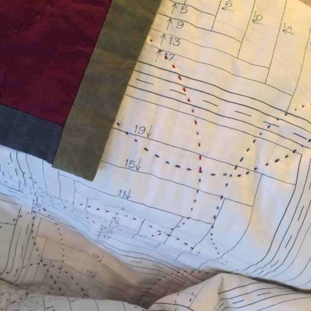 Reverse of log cabin quilt showing pattern