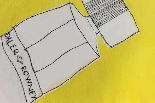 White embroided Daler and Rowney paint tube with yellow background