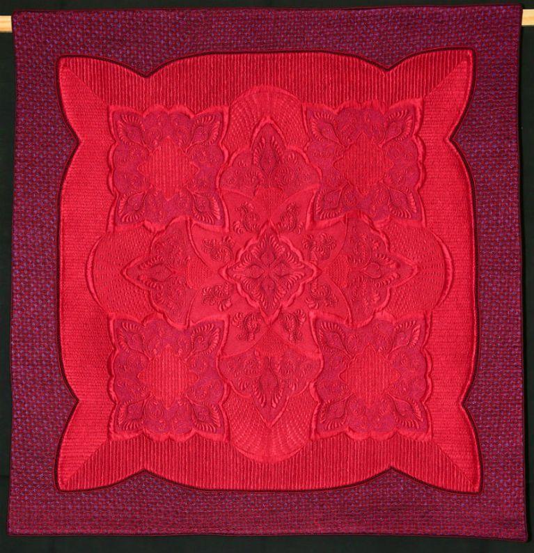The Trouble with Magenta, hot or not by Annelize Littlefair: Traditional Quilt with floral design in magenta with a purple border