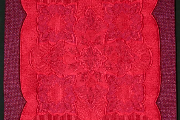 The Trouble with Magenta, hot or not by Annelize Littlefair: Traditional Quilt with floral design in magenta with a purple border