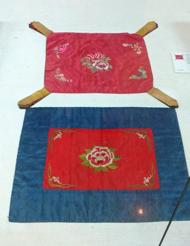 Embroidered wrapping cloths, 19th century, on display at the Chojun Textile and Quilt Art Museum