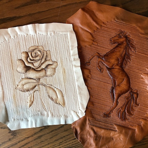 Embroidered brown fabric with a horse design and an embroidered rose on beige fabric