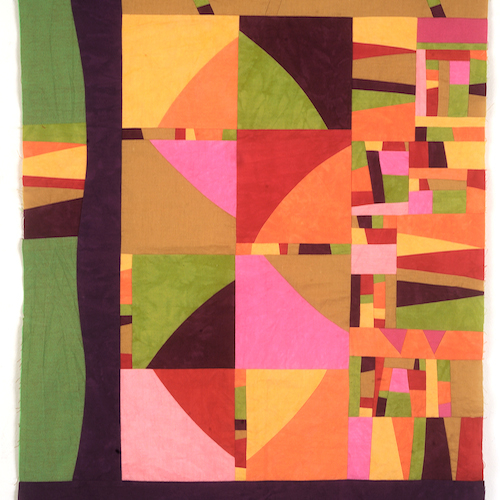 Modern block pattern with multiple shaped and sized blocks in green, yellow, pink, red and orange.