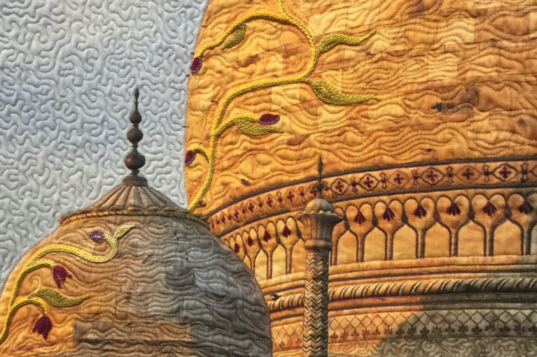 Gold colour quilt of Taj Mahal at Sunset