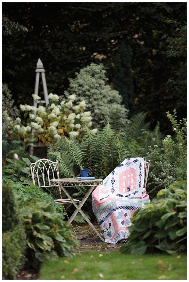 Quilt placed on an outside chair 