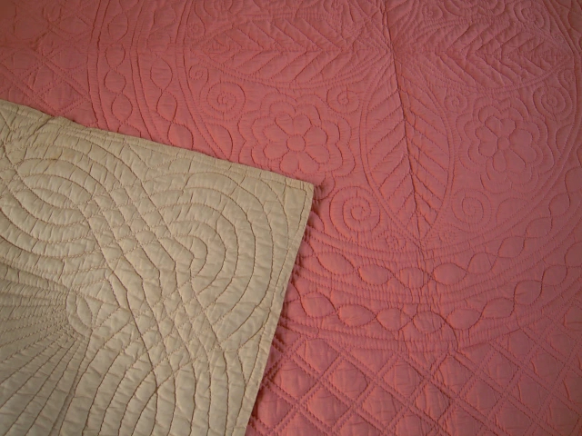 Example of Welsh quilt from Aberdare: one side red the other beige