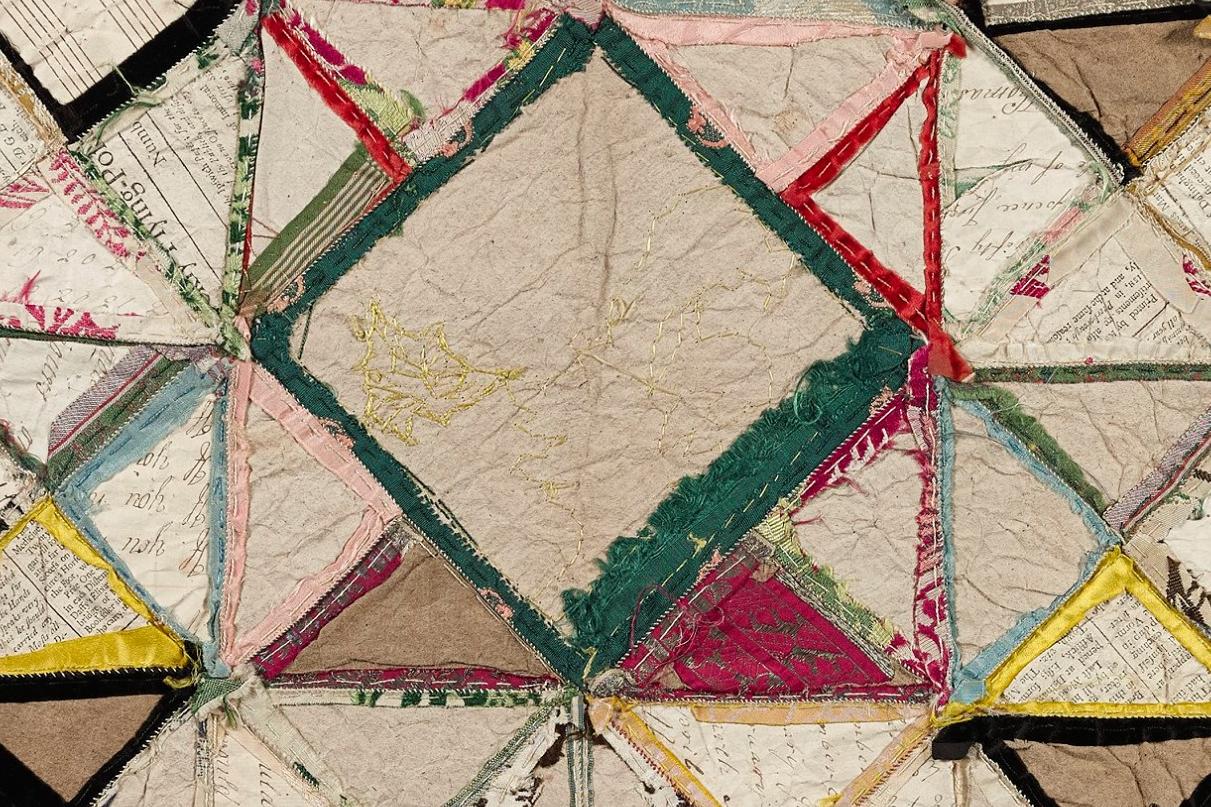 Rear of a quilt showing all of the working marks