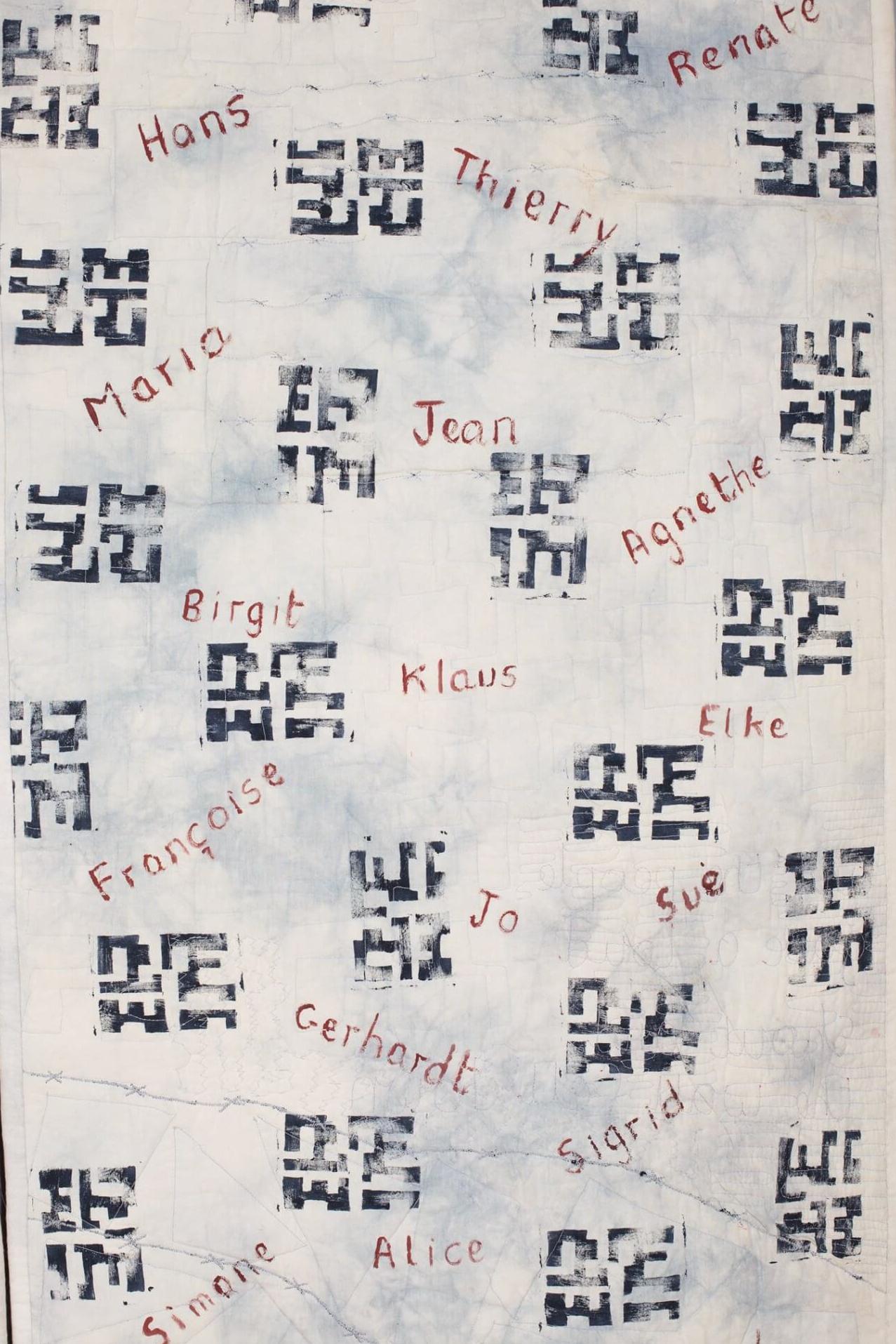 Quilt that has been painted on the reverse with the names of those who died trying to cross the berlin wall