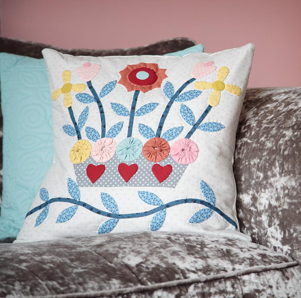 Appliqué cushion on a sofa