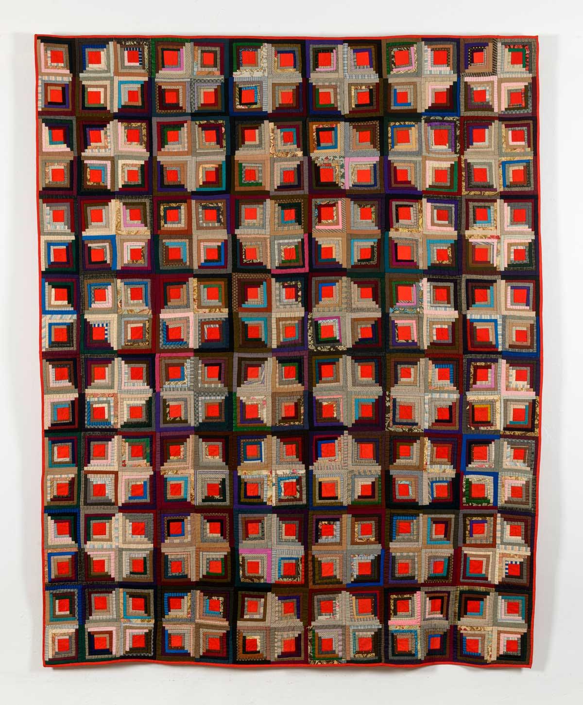 Quilt with an arrangement of light and dark fabrics, which results in a layout called The Cross