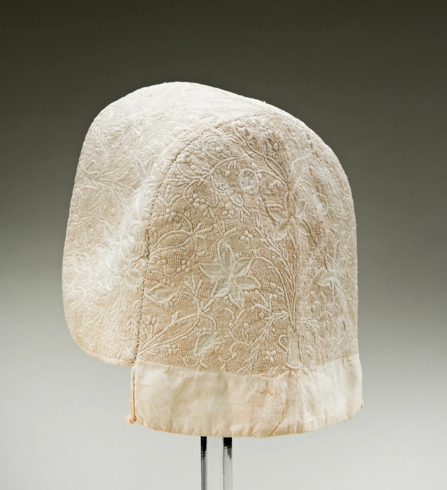Off-white with floral pattern 18th Century Corded Baby?s Cap