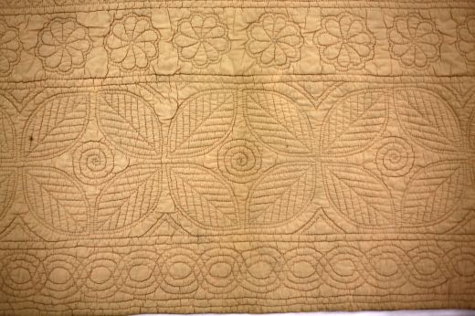 Claridges? Peach Wholecloth Quilt: Peach coloured quilt with foliage and floral pattern design