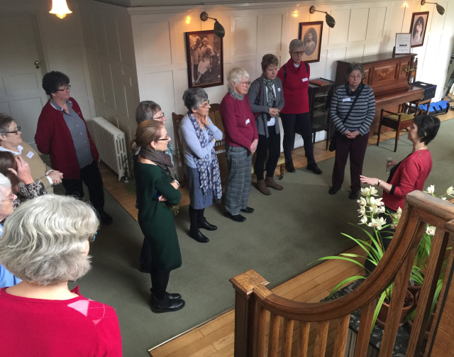 Collections Officer, Henrietta Lockhart, talks to Guild members about the history of Winterbourne House and the Nettlefold family during a house tour.