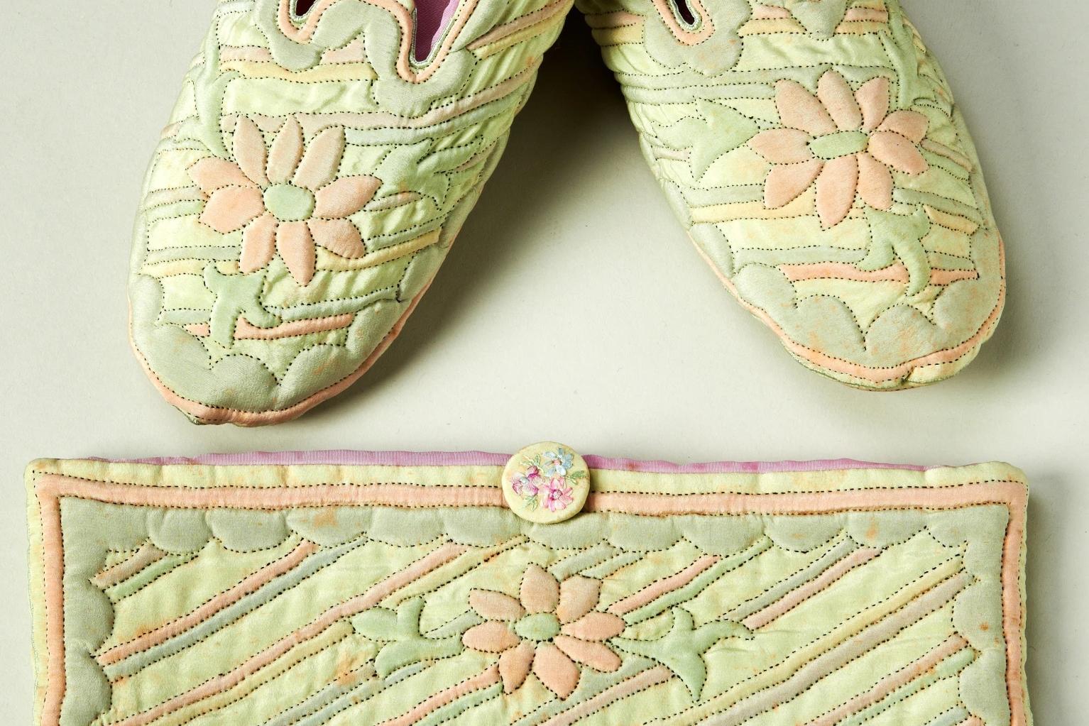 Green quilted slippers and purse with flower pattern
