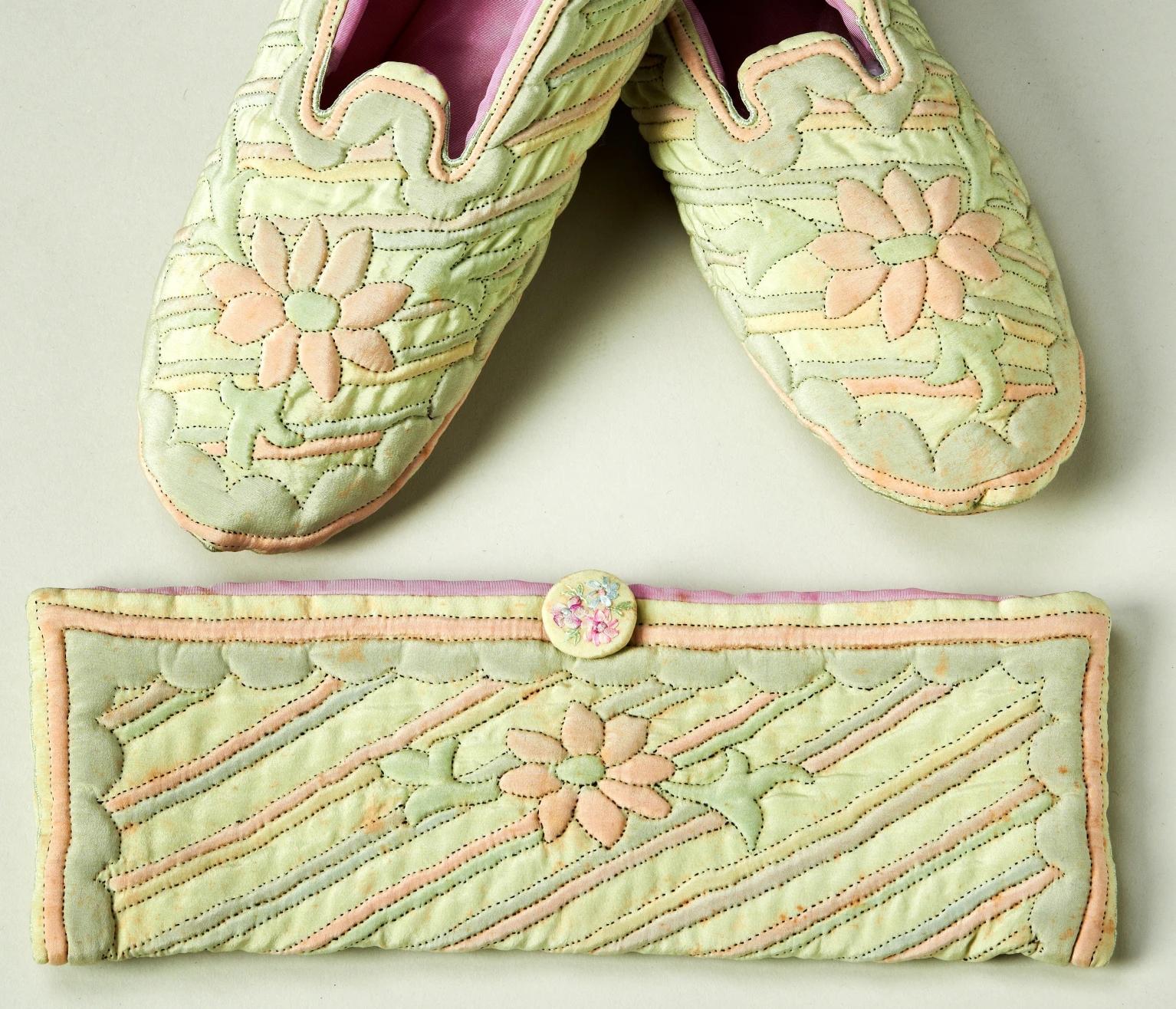Green quilted slippers and purse with flower pattern