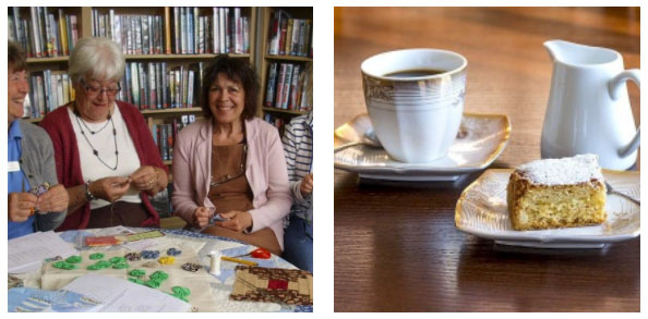 Ladies sat round a table with tea and cake