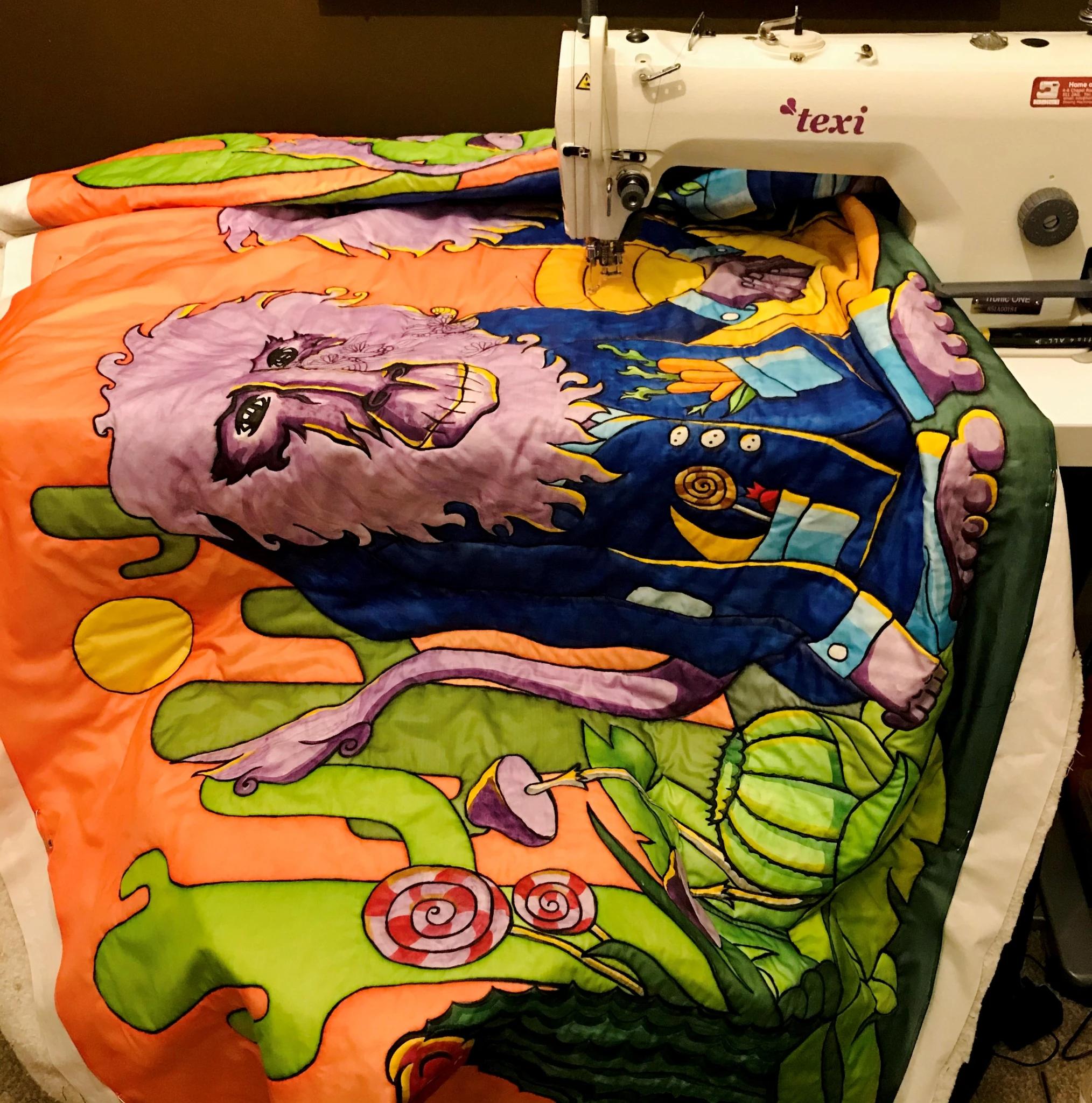 A quilt being worked on in a sewing machine