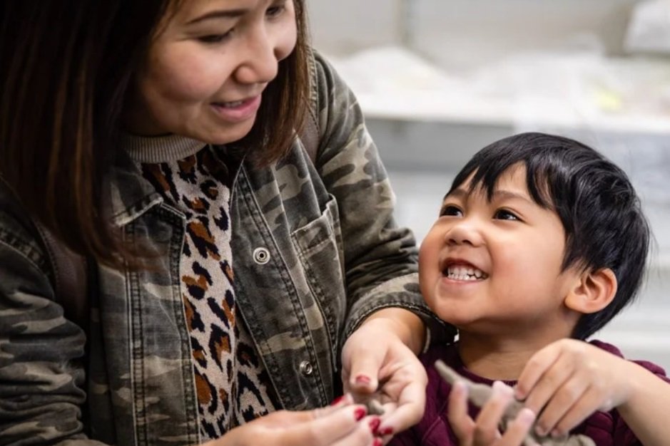 Parent and child doing a craft activity