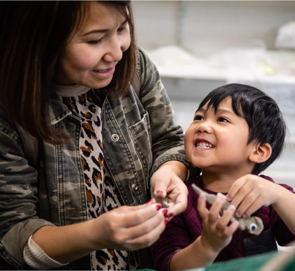 Parent and child doing a craft activity