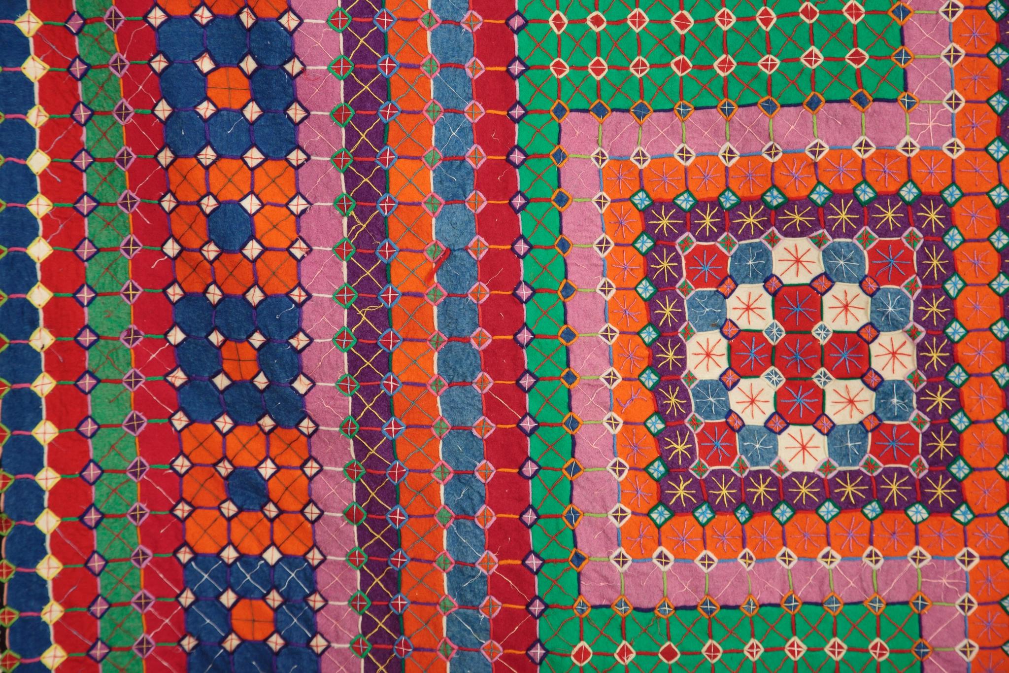 Close up image showing detail in Uncle Tom's Patchwork Coverlet, c.1910-1920.