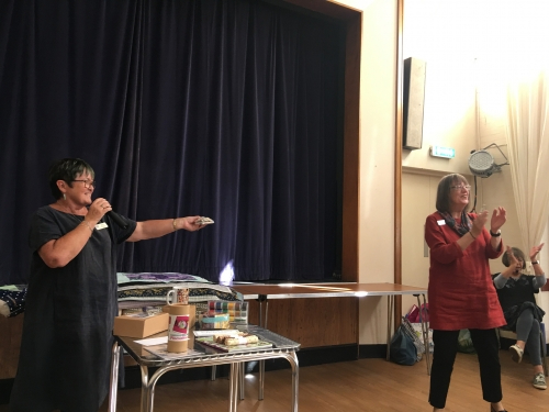 Women running a raffle