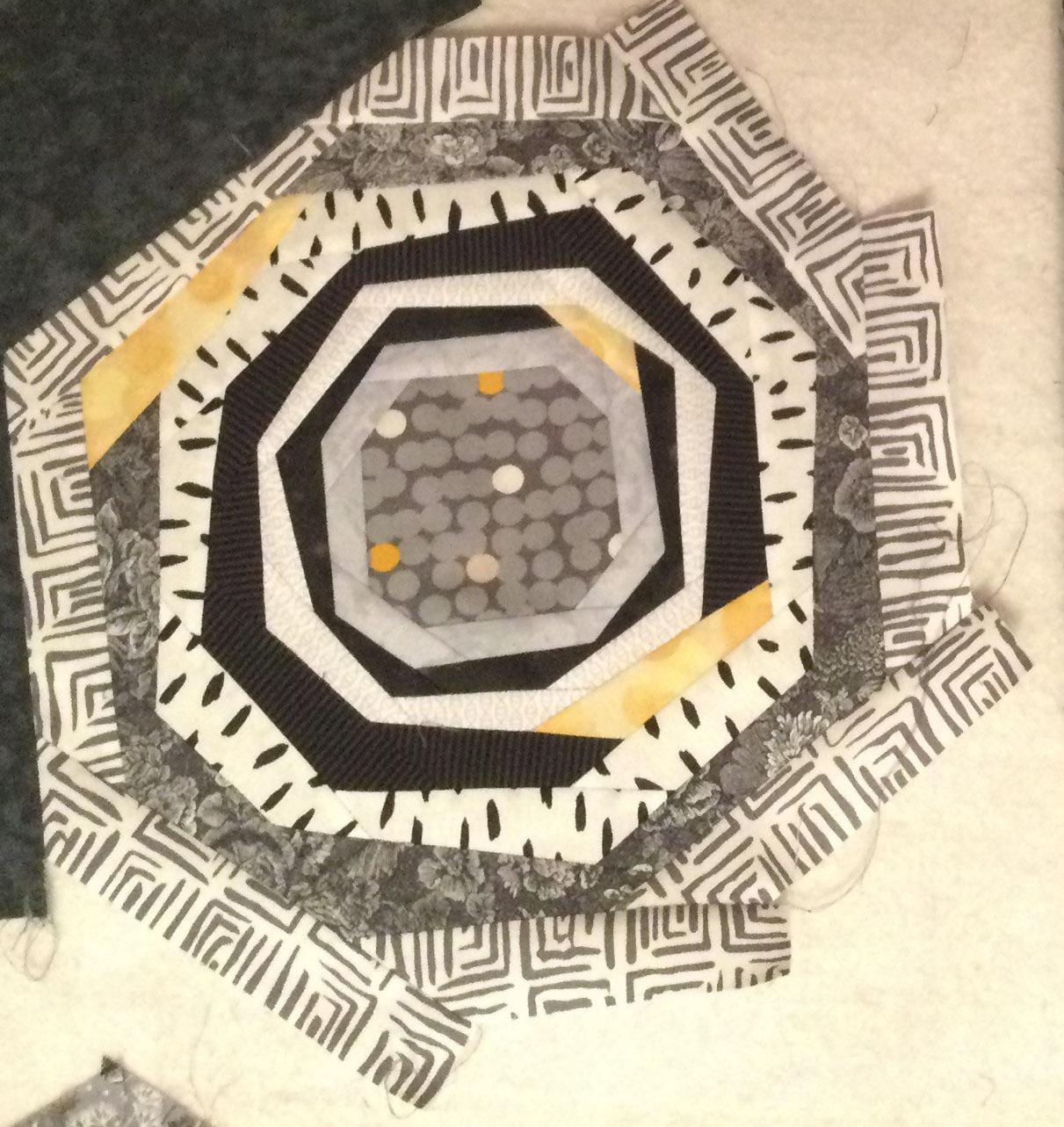 Grey yello hexagon