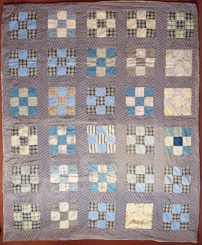 Ninepatch quilt in blues and beige
