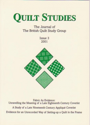 Booklet with four green diamonds on cream background