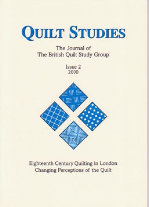 Booklet with four blue diamonds on cream background