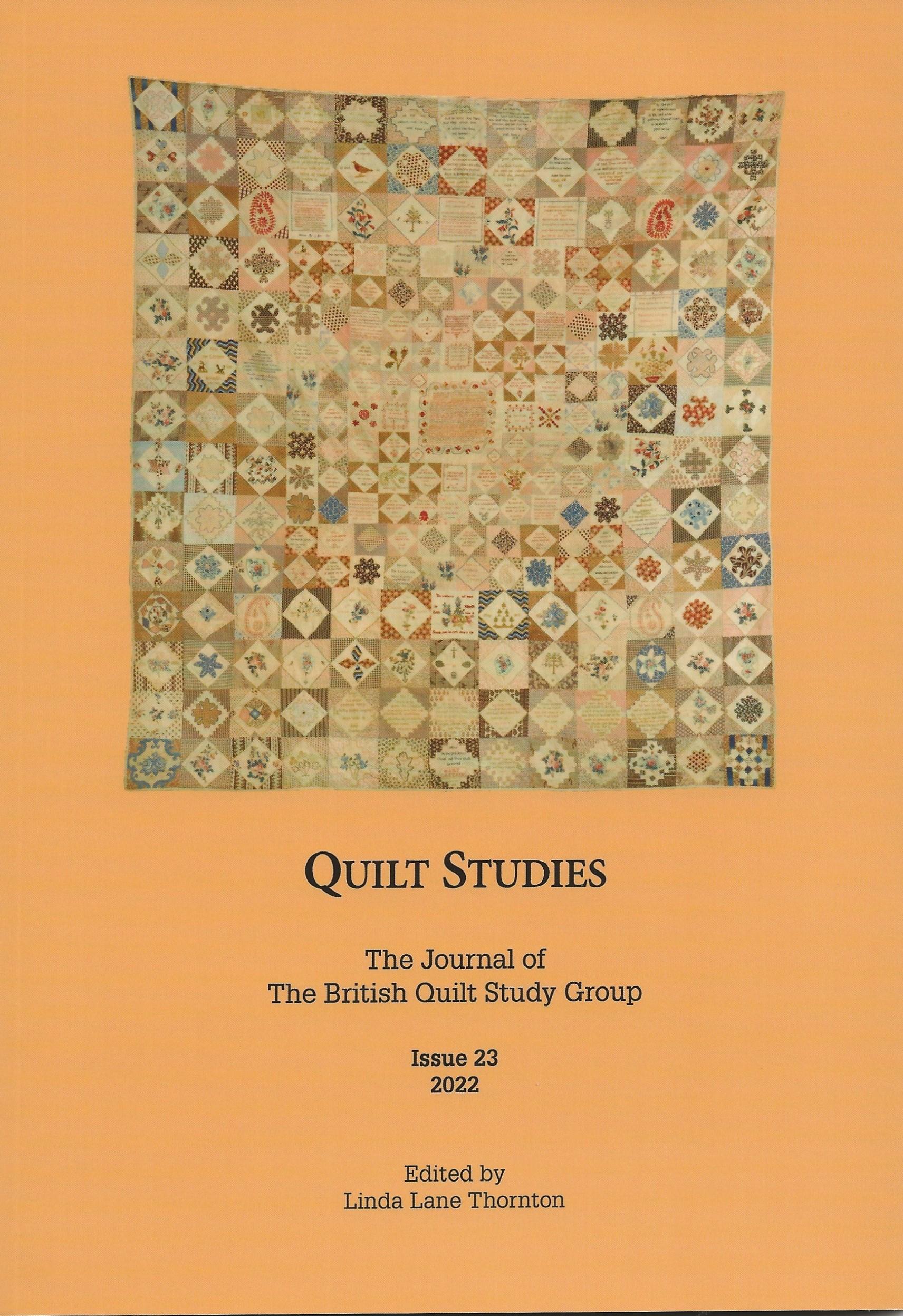 Patchwork quilt on orange background