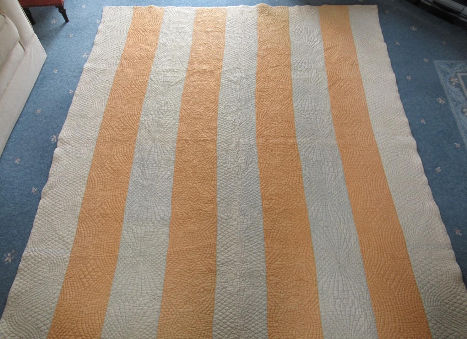 Yellow and cream strippy quilt