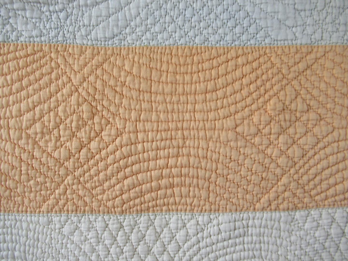 Quilting detail on yellow strip
