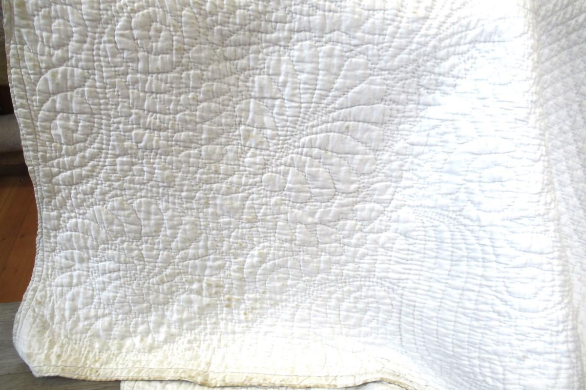 White quilt detail, corner