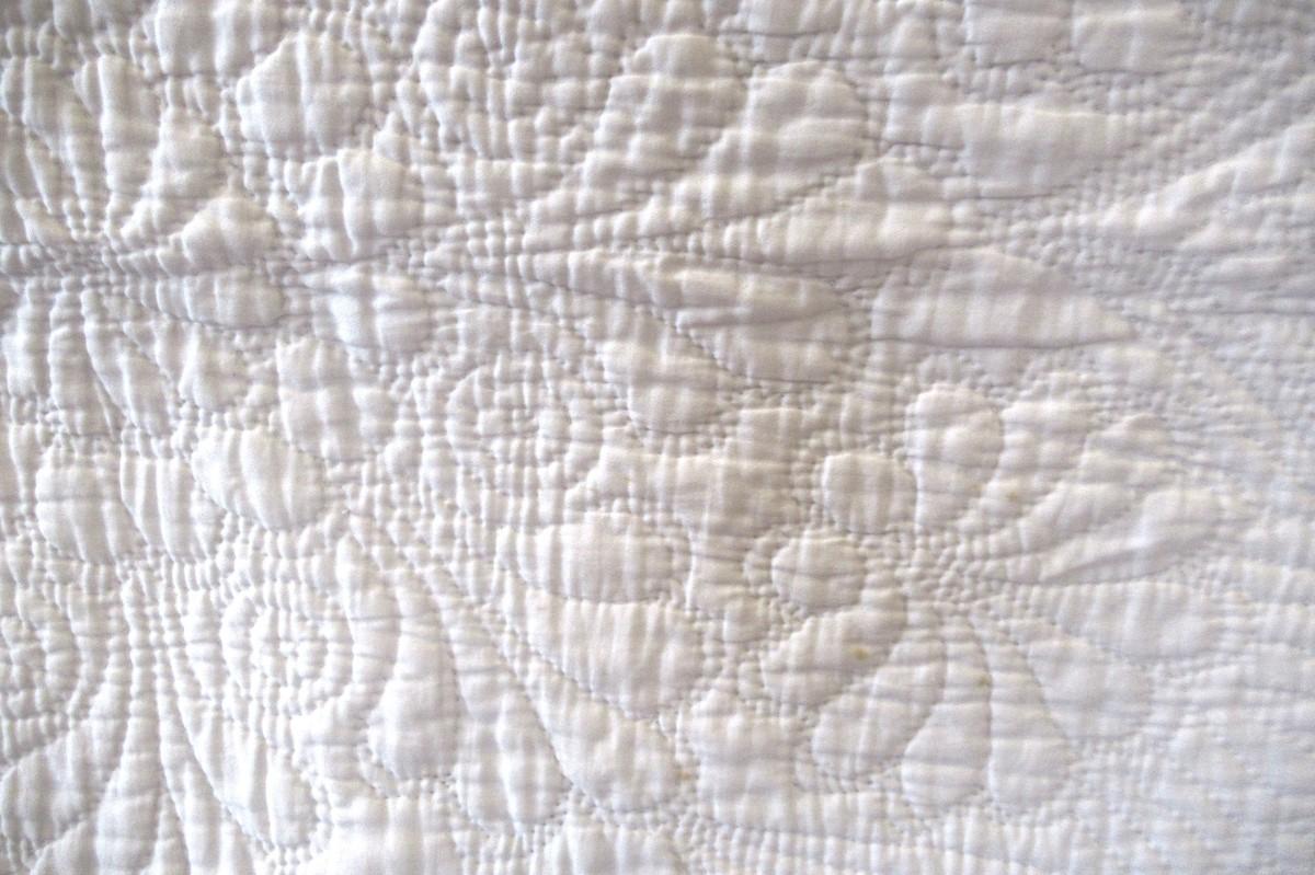 White quilt detail