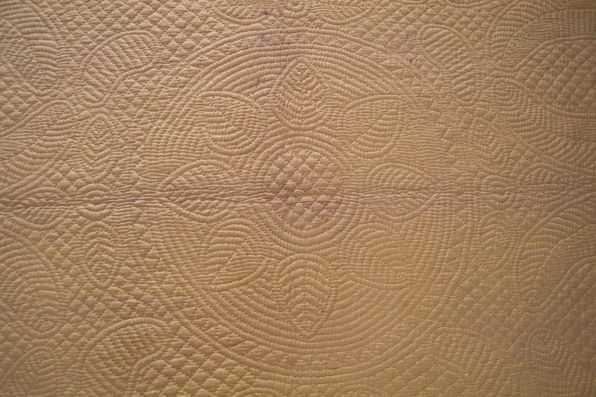 Detail of centre of yellow quilt
