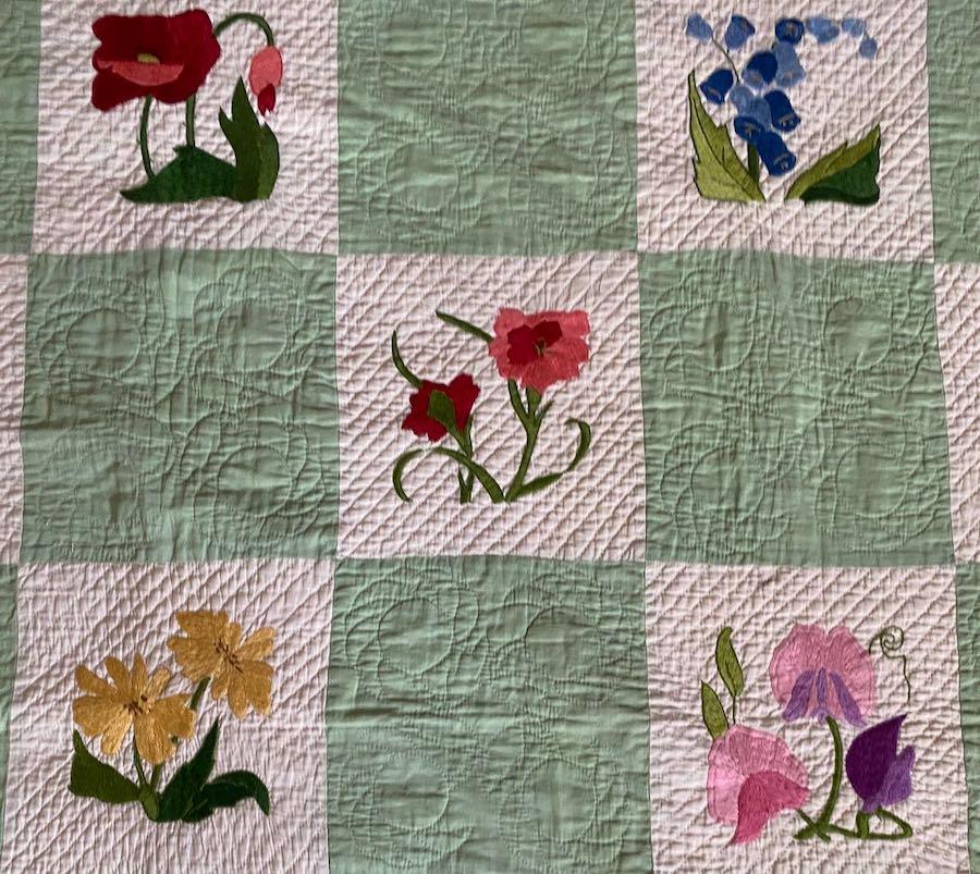 Detail of five of the embroideries