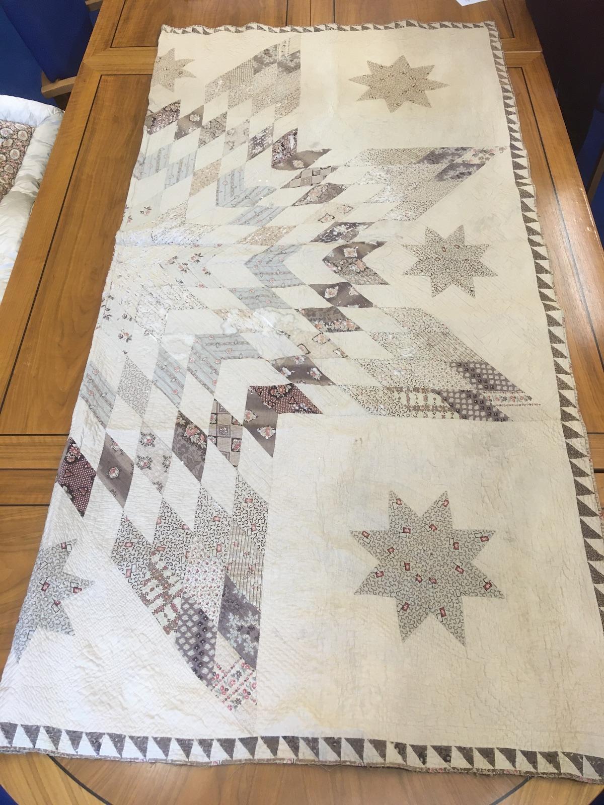Half of patchwork quilt in large star design