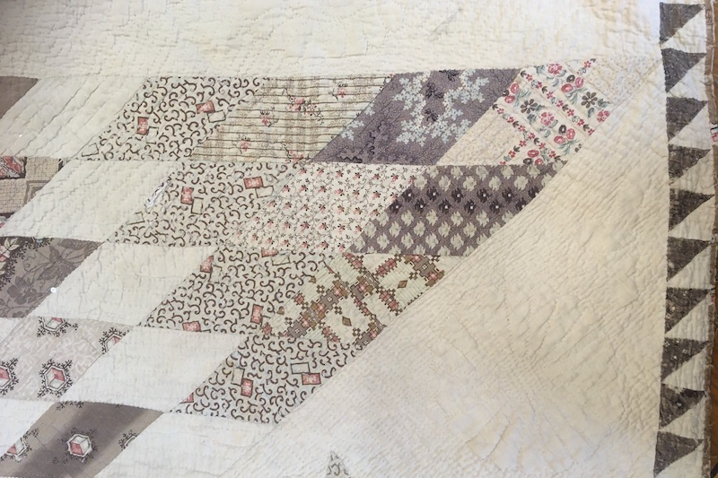 Diamonds of fabric stitched into Lone Star Patchwork design