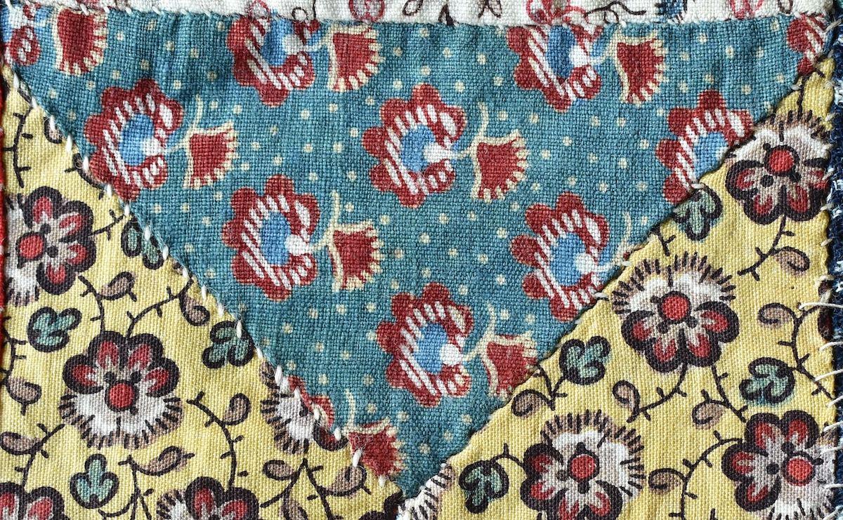 Blue and red printed design perfectly aligned on fabric