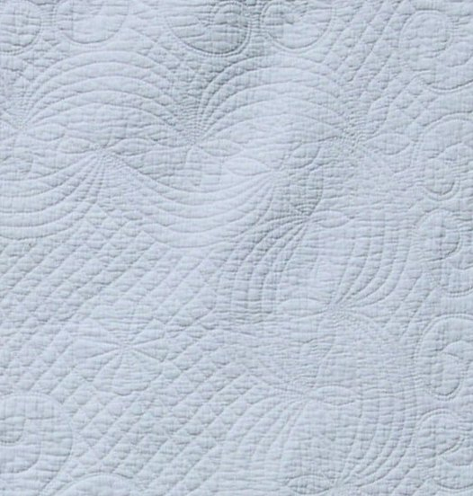 Quilted swag border with balanced corner