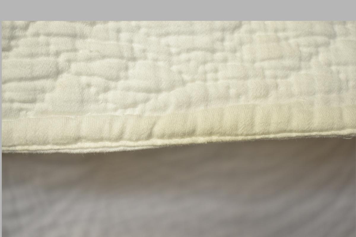 Edge of white quilt