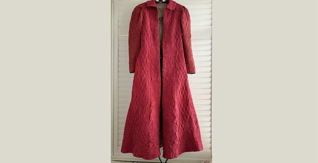 Red hand quilted dressing gown with spirals down front