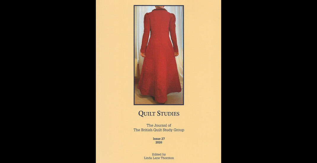 Quilt Studies booklet with red dressing gown on the cover
