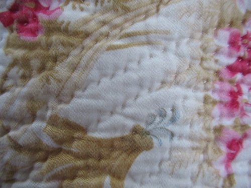 Detail showing neat but well spaced quilting stitching