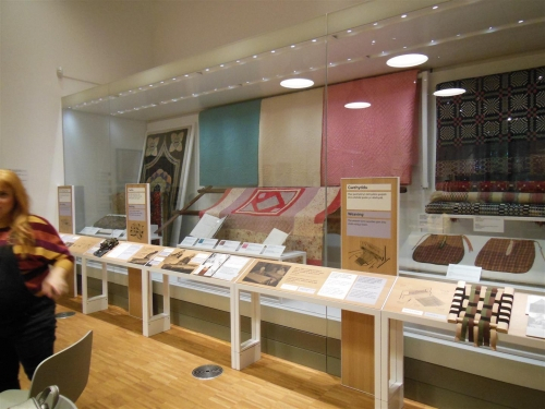Dispaly of colourful quilts and notices