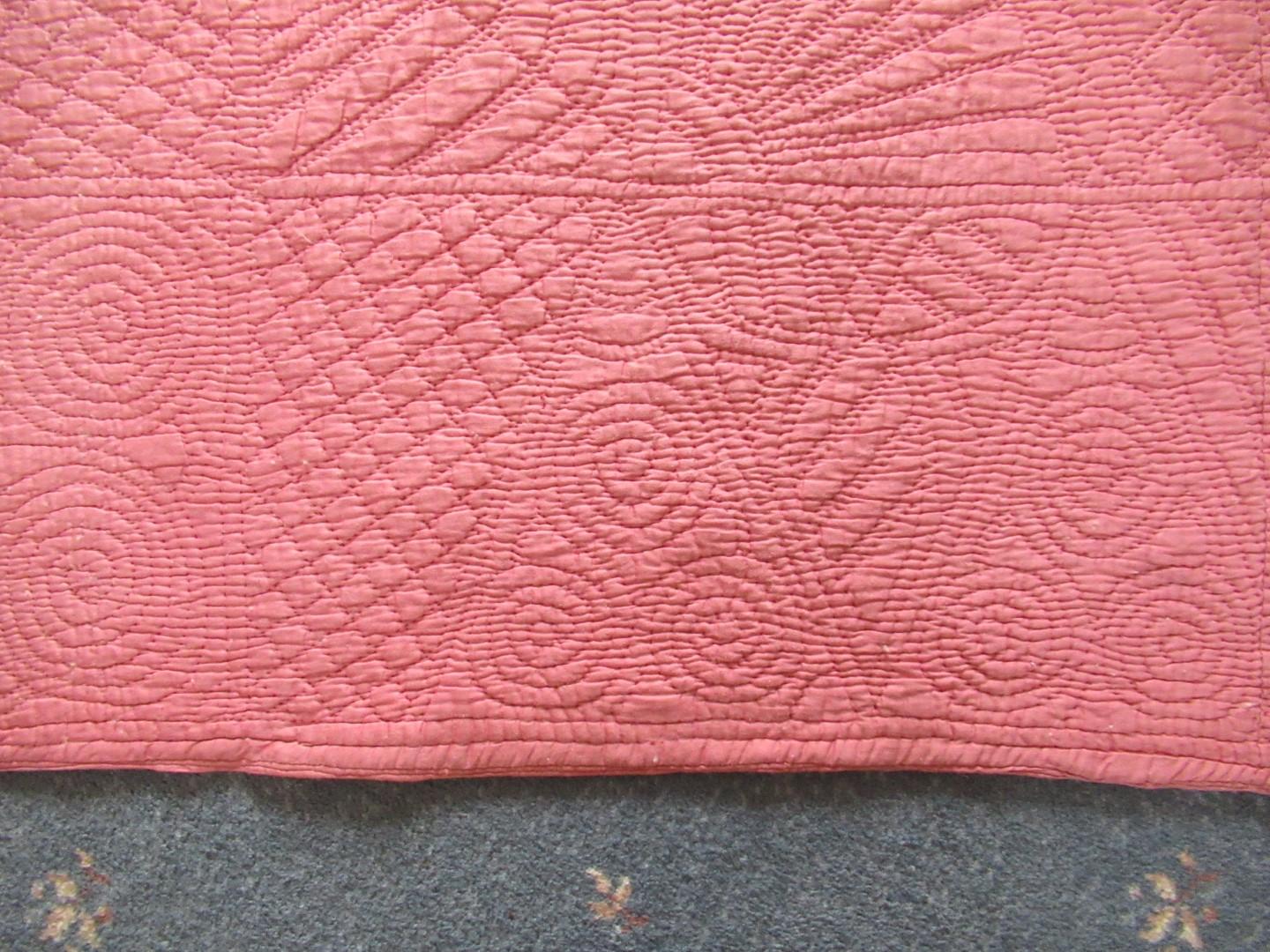 Pink quilt close up of border