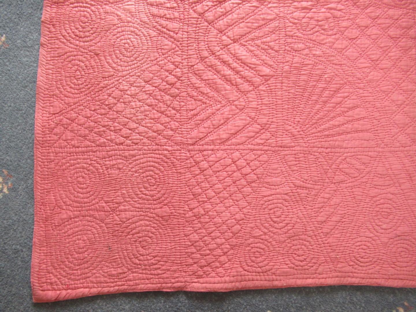 Corner of a pink quilt